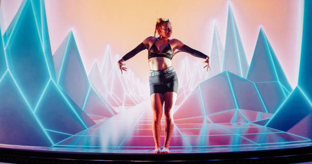 istock Female modern dancer performing on projection background. Inside surreal, digital landscape with purple mountains and neon lightning 1302979109