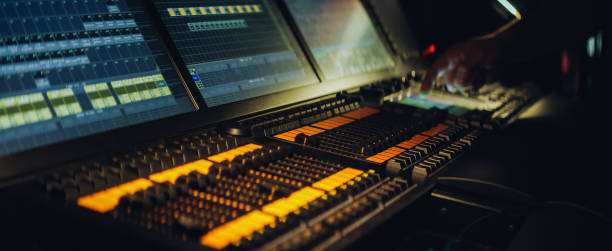istock Man setting video projection. Monitors with video and sound mixing tracks in studio 1302979222