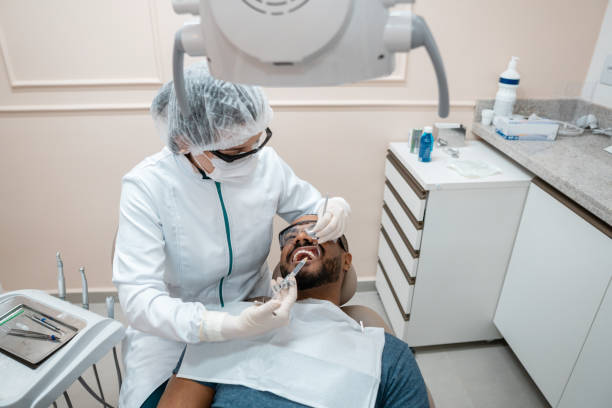 istock Dentist giving anesthesia to patient 1302979546
