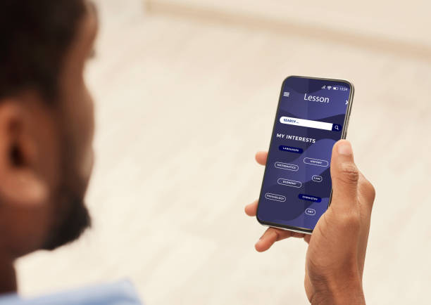 istock Unrecognizable Black Man Having Online Lesson In Educational App On Smartphone 1302982244