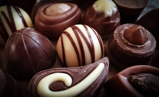 istock chocolate candy, sweet dessert background 1302984576