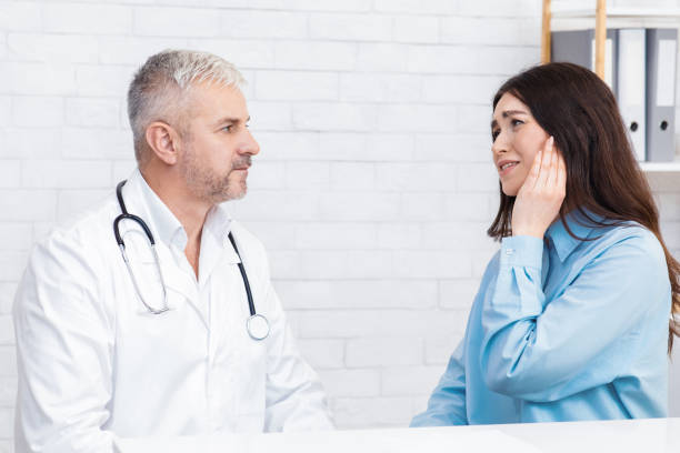 istock Ear, head disease, migraine and patient complaints 1302986138