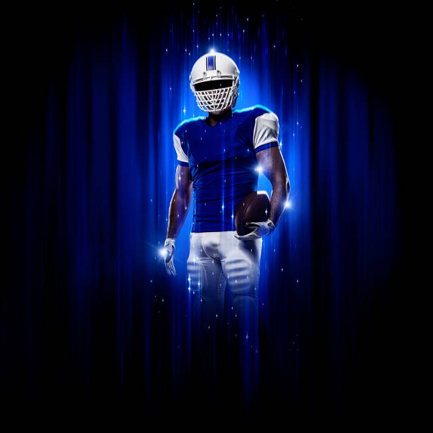 istock Hero Football Player wearing a blue uniform 1302987748
