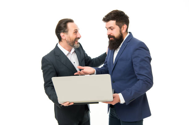 istock Web site concept. SEO success factors. Online entrepreneurship. Men working laptop. Web pages content easily discoverable searching terms. Commercial intent. Search engine optimization. Web developer 1302994879