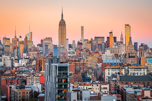 New York City, USA midtown Manhattan skyline at dusk.