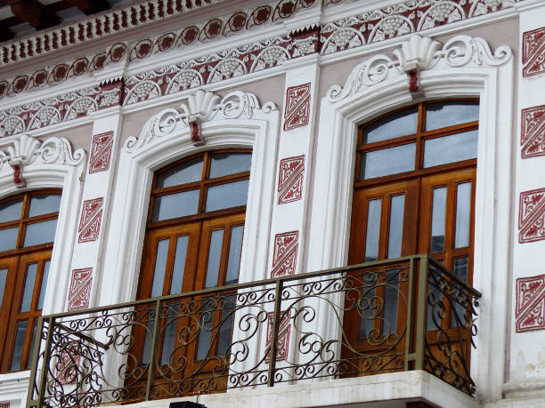 istock Vintage stucco facade, colonial Cuenca, Ecuador 1302997941