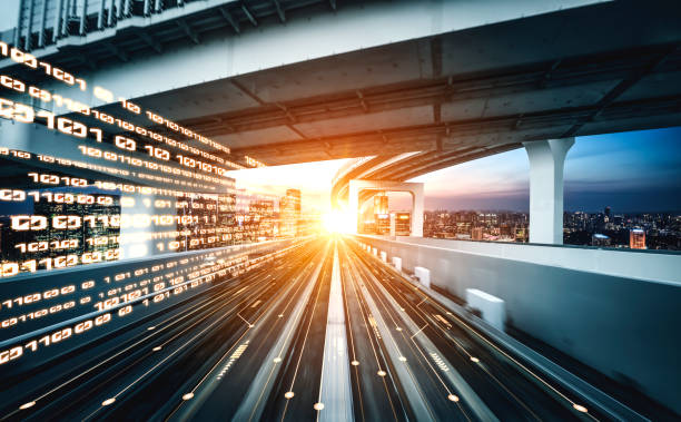 istock Digital data flow on road with motion blur to create vision of fast speed transfer 1302998902