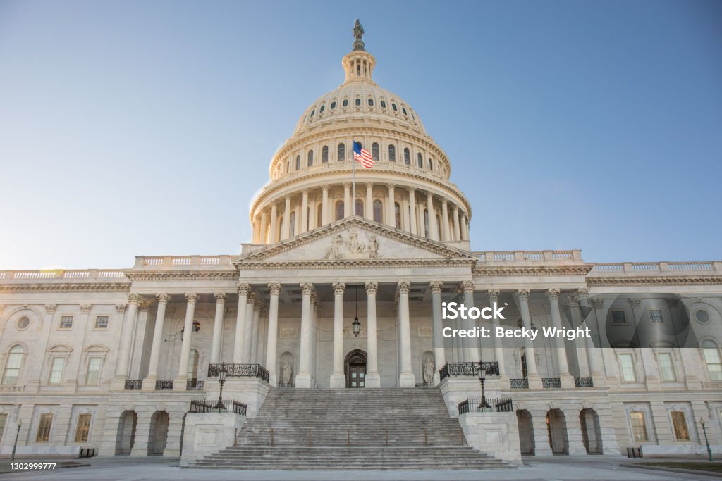 The Capitol Building in Washington, D.C. with bright blue sky. Capitol Building - Washington DC Stock Photo