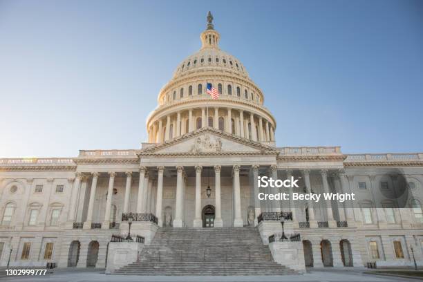 The Capitol Building In Washington Dc With Bright Blue Sky Stock Photo - Download Image Now