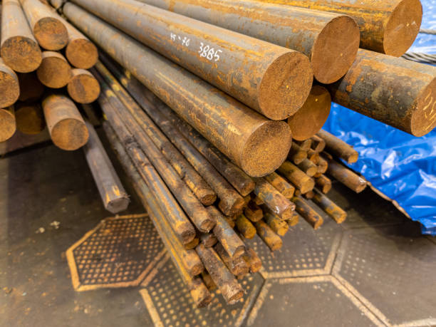 istock rusted round steel bars pack - close-up view on ends with selective focus 1303000106