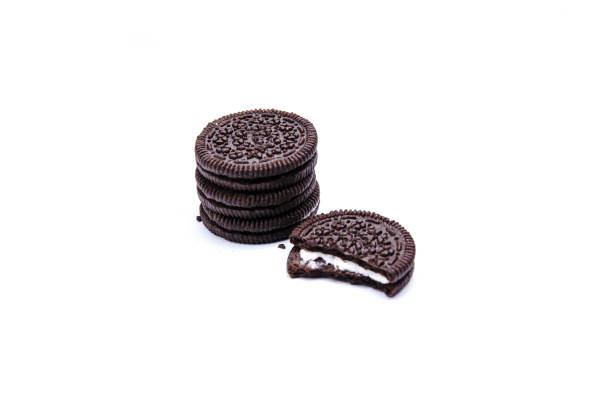 istock Dark Biskuits with a layer of milk cream 1303001404