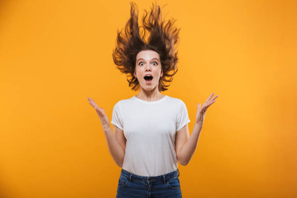 istock Shocked young woman looking camera. 1303003754