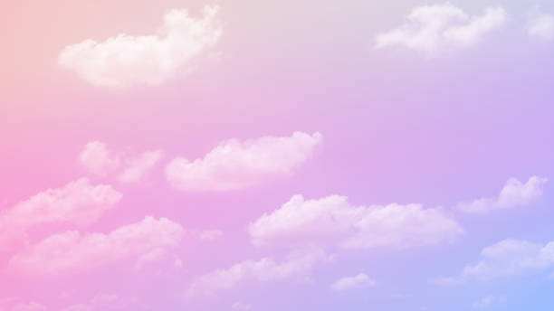 istock soft pastel with fluffy clouds on sky. multi color beauty rainbow image. love pink light. 1303003987