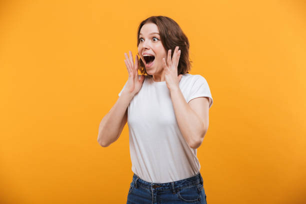 istock Shocked young woman looking camera. 1303005628