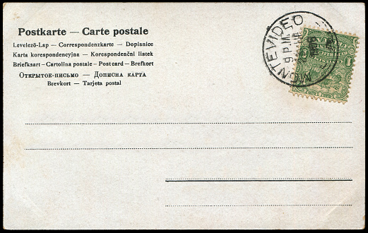 Vintage blank postcard in different languages in early 1900s, a very good background for any usage of the historic postcard communications.