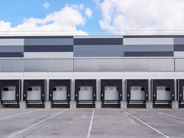 istock Row of Loading and unloading ramps of large warehouse 1303008479