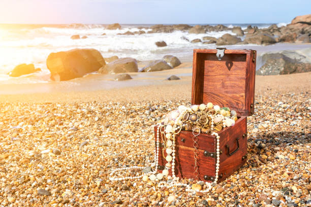 istock Treasure chest on the ocean beach 1303008534