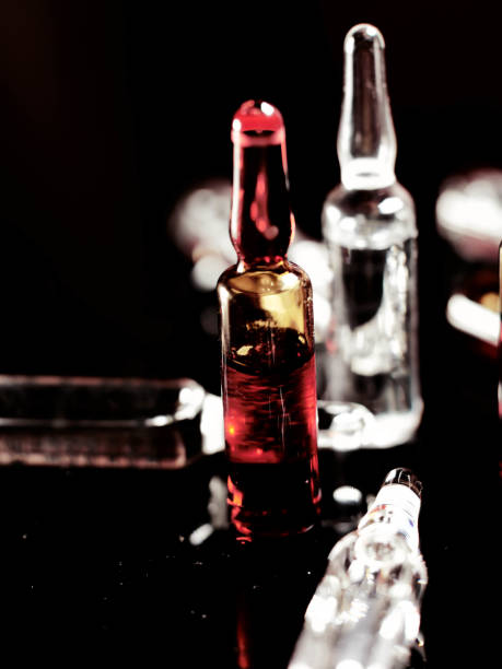 istock Medical ampoules close up. Many ampoules. 1303008549