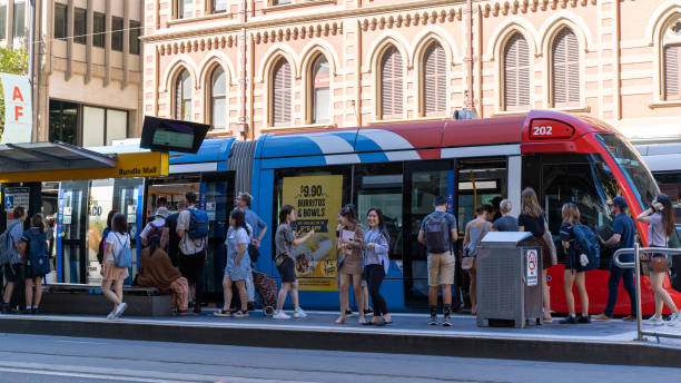People taking the tram in Adelaide CBD Adelaide, Australia - 18 Feb 2021:
Many people is taking the tram in the Adelaide CBD. public transportation stock pictures, royalty-free photos & images