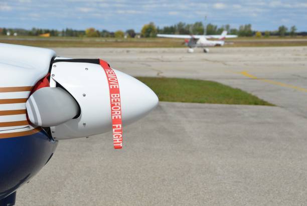 istock Closeup of a propeller with the Remove before flight banner 1303016609