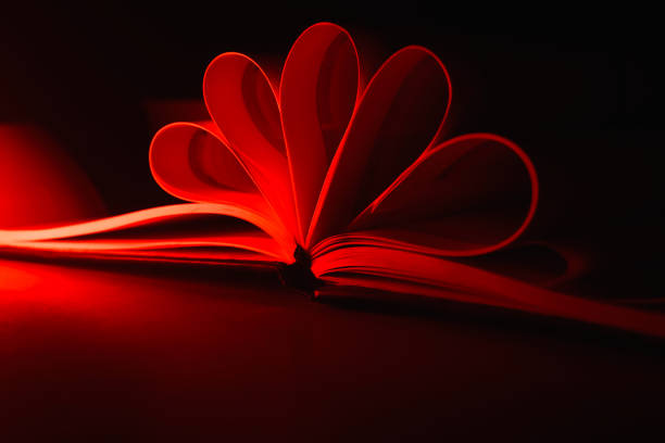 istock Reddish folded pages of a notebook unique photo 1303019175