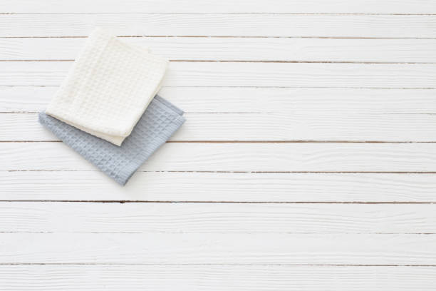 istock cloth napkins on white wooden table 1303019467