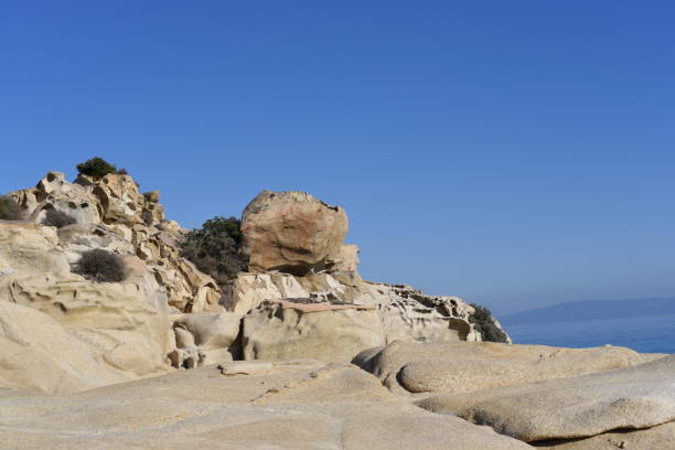 istock rocks near the sea 1303021203