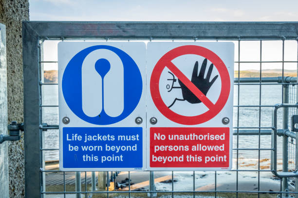 istock Red no unauthorised persons allowed beyond this point and life jackets must be worn sign 1303021549