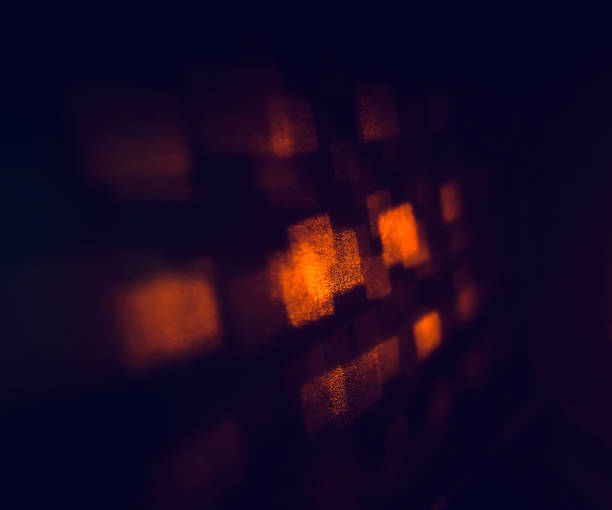 istock Dark shadows with orange lights glowing background 1303022143
