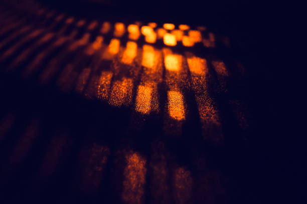 istock Orange lights with black shadows unique photo 1303022751