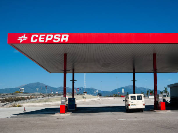 Cepsa red gas station in Cartama, Guadalhorce valley, white van stock photo