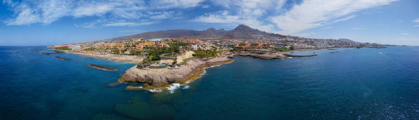 180 degree aerial panorama of costa adeje resort and playa del duque beach, tenerife, canary islands, spain. - playa de las américas imagens e fotografias de stock