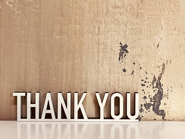 istock Short phrase Thank you on golden grunge background 1303032037
