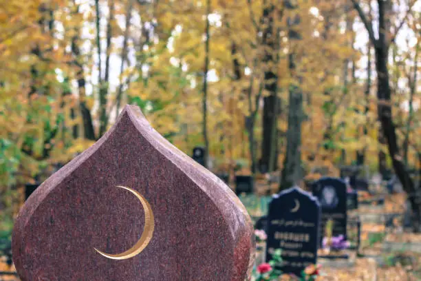 Grave site with crescent moon.