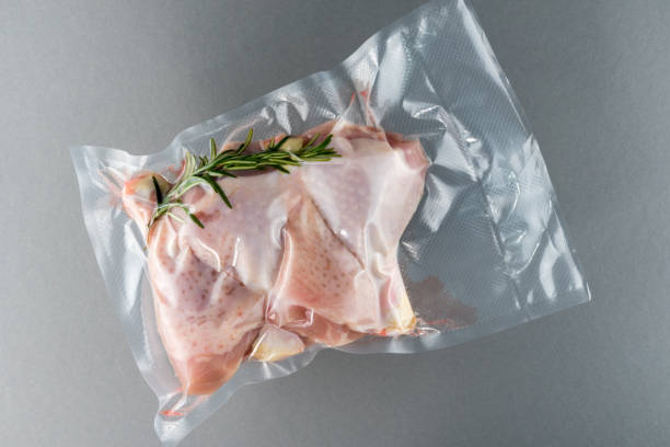 istock Chicken thighs vacuum packed sealed 1303033516