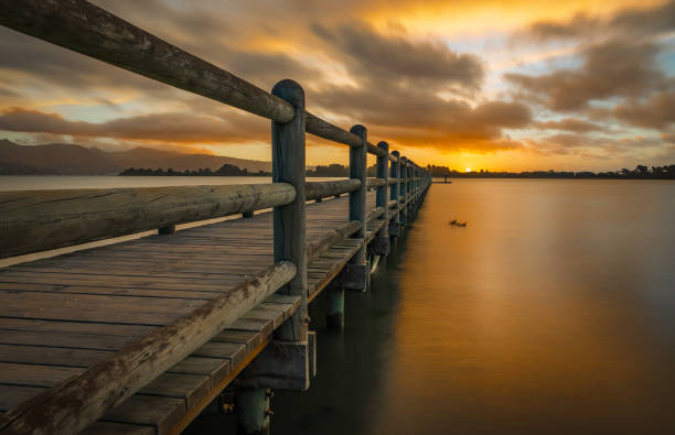 istock Sunset at a Christchurch jetty 1303034099