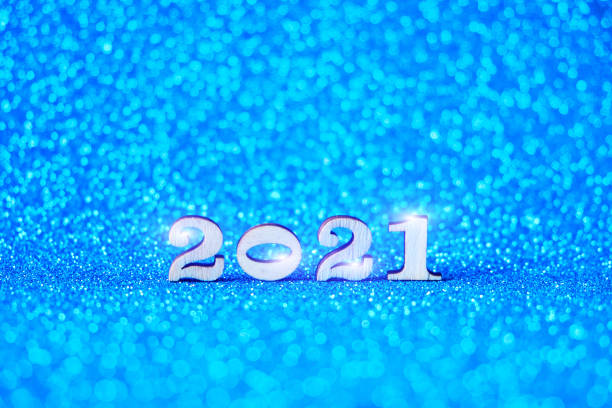 istock Figures for 2021 on a blue background.Coming new year. 1303037327