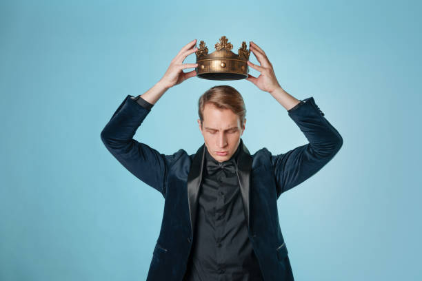 istock Crown yourself, a successful young businessman with a crown over head. 1303037479