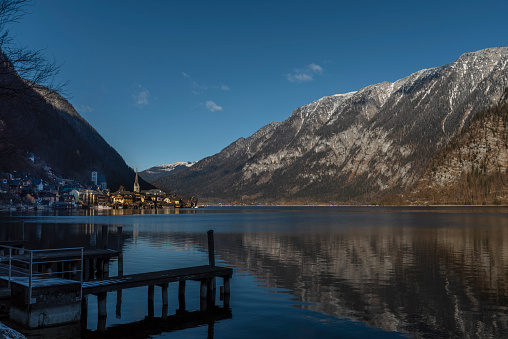 Beautiful landscape with the reflection of the snowcapped mountains in a lake at the snow line in the Verwall Alps, Vorarlberg