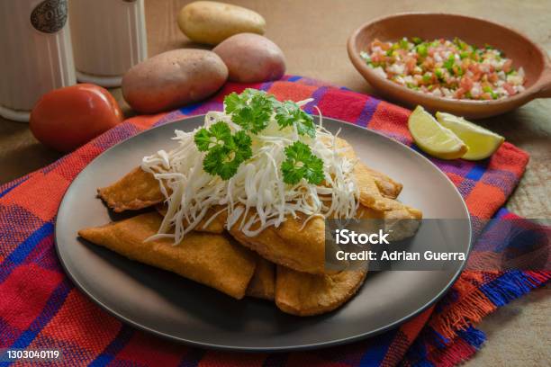 Homemade Stuffed Meat Empanadas On A Background Also Called Pastelitos De Perro In Honduras Stock Photo - Download Image Now
