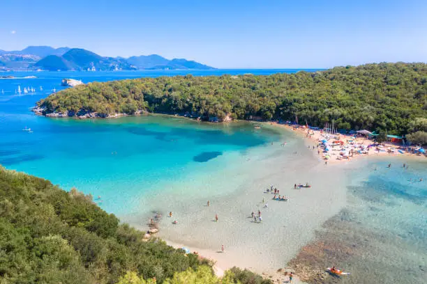 Aerial view of iconic paradise sandy beaches with turquoise sea in complex islands of Agios Nikolaos and Mourtos in Sivota area, Epirus, Greece