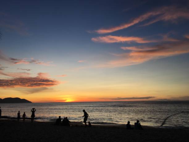 istock Sunset at beach in Penang, Malaysia 1303040437