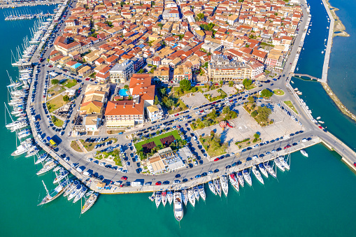 Lefkas (Lefkada) town, amazing view at the small marina for the fishing boats with the nice wooden bridge and promenade, Ionian island, Greece