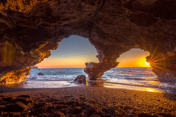 istock Gorgeous sunset at Agios Pavlos beach, south Crete, Greece. 1303045038