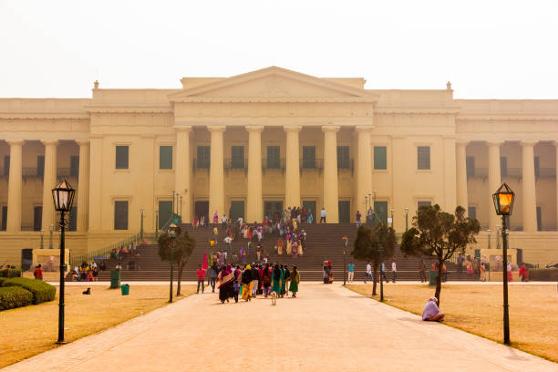 Murshidabad, West Bengal, India - January 2018: Tourists at the old monument of the Hazarduari Palace in the town of Murshidabad.
