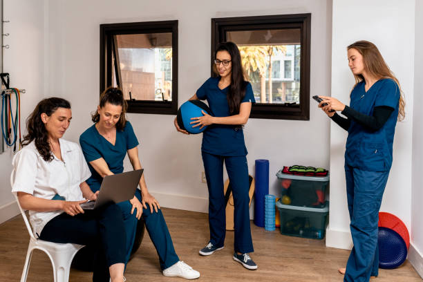 istock Work Team in Physiotherapy Clinic 1303052747
