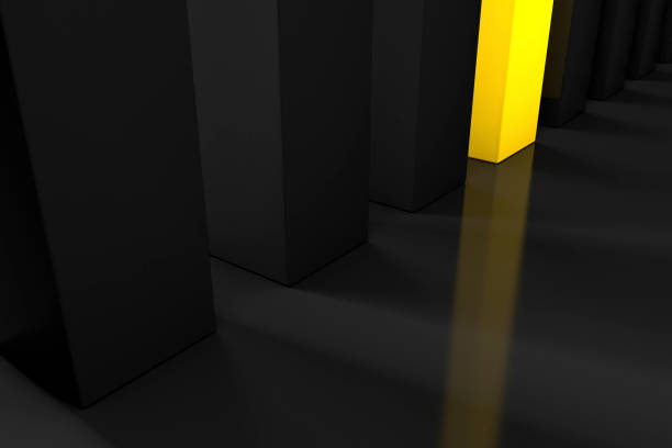 istock black shadows projected from a row of aligned pillars and a bright yellow pillar in the middle 1303053859