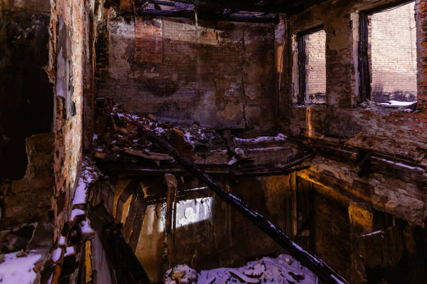 istock Burnt old house interior. Consequences of fire 1303054684