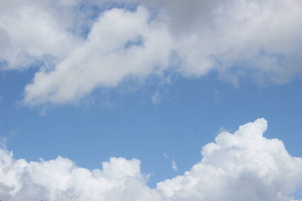 istock white cumulonimbus clouds in the blue sky 1303068946