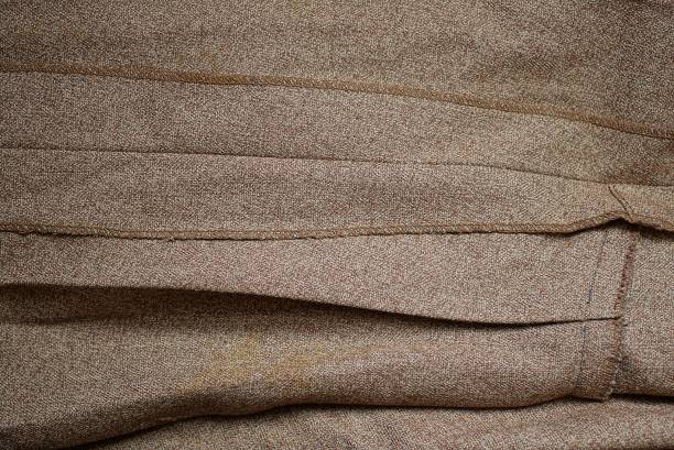 istock brown gray fabric texture from a crumpled piece of cloth 1303069927